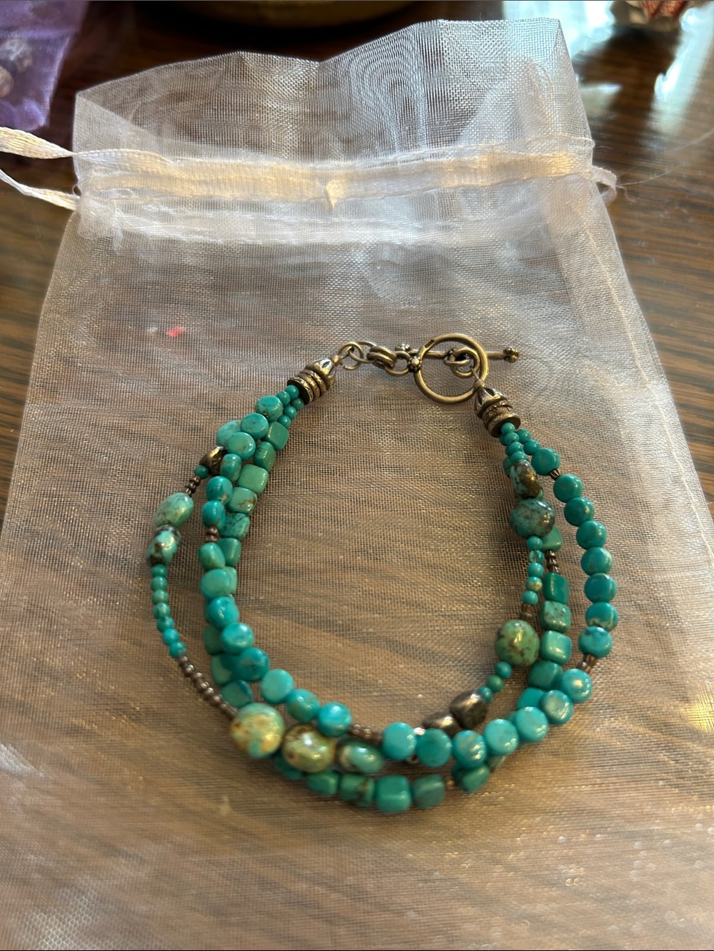 Turquoise Multi-Strand Beaded Bracelet with Antiqued Accents